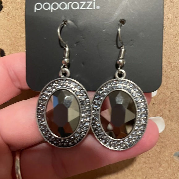 Oval smoky gray stones accented by dark gray rhinestones. Fishhook earrings.